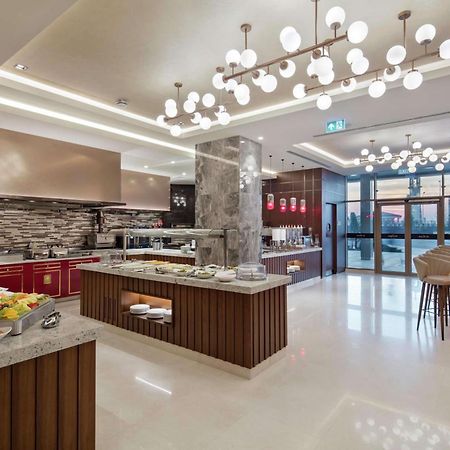 Doubletree By Hilton Skopje Hotel Luaran gambar The Kitchen Table